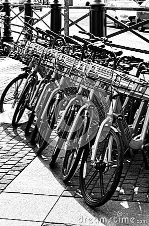 Black and white concept bike `smart bike` with baskets for rent Editorial Stock Photo
