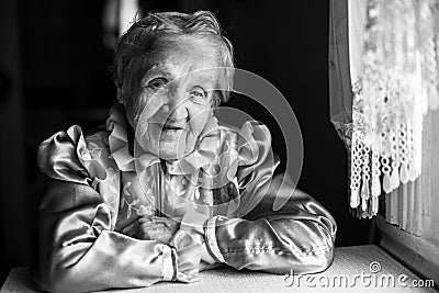 Portrait of the Russian elderly women in ethnic dress. Stock Photo