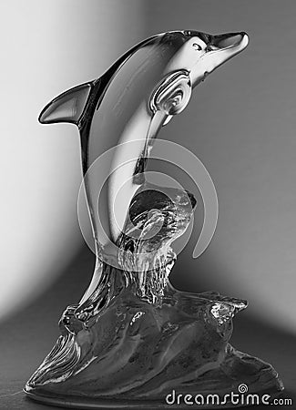Black and White Dolphin Glass Statue Stock Photo