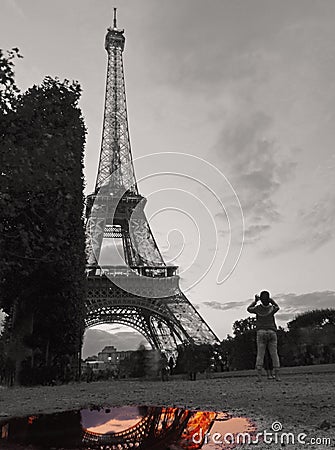 Black and white Eiffel Tower with Parisian colour in the water Editorial Stock Photo