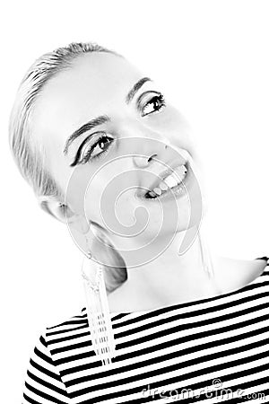 Black and white expressive portrait of a young stylish woman wearing stripes in the studio Stock Photo