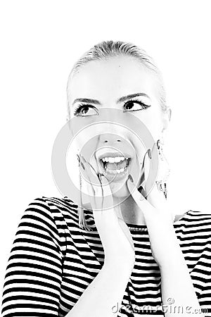 Black and white expressive portrait of a young stylish woman wearing stripes in the studio Stock Photo