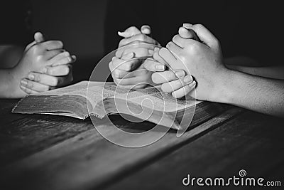 Black and white of group people praying worship believe Stock Photo