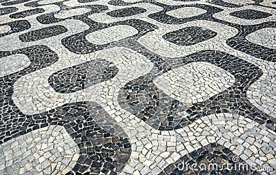 Black and white iconic mosaic, Portuguese pavement by old design pattern at Ipanema beach, Rio de Janeiro Stock Photo