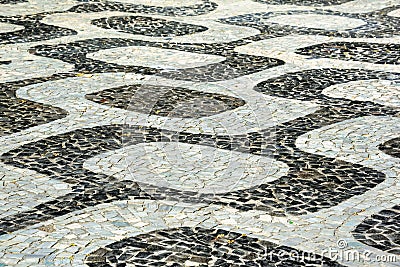 Black and white iconic mosaic, Portuguese pavement by old design Stock Photo