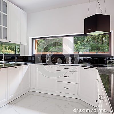 Black and white kitchen with long window Stock Photo