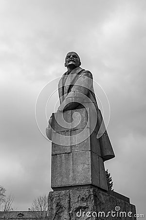 Black and white monument from granite to leader of world proletariat Lenin Stock Photo