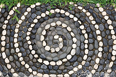 Black and white pebbles mosaic floor Stock Photo