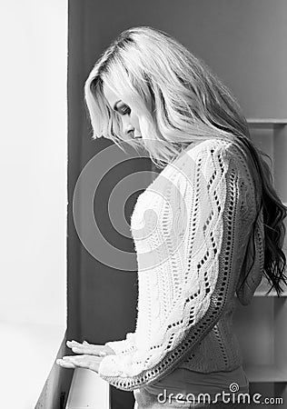 Black and white photo of lonely young woman Stock Photo