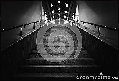Black and white photo of night stairs with lanterns Stock Photo