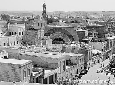 Black and white photo with panoramic view of Midyat city in Southeast Anatolia region, Turkey Editorial Stock Photo
