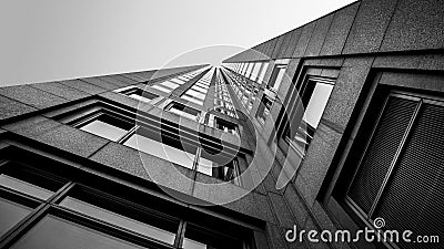 Abstract Architecture of a Building Photographed from Ground Up Vanishing Perspective - Black and White Stock Photo
