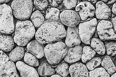 Black and white photograph of a decorative pattern of stones from the sea shore Stock Photo