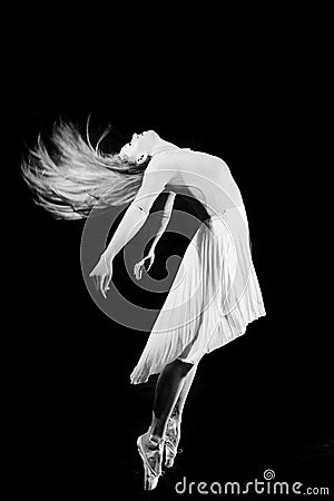 Black and white photography of beautiful young woman in dancing Stock Photo