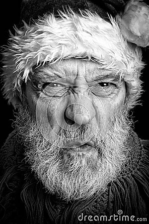 Black and white portrait of an adult man disguised in Santa Claus Stock Photo