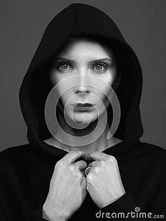 Black and white portrait of Halloween Widow in hoodie Stock Photo