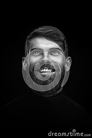 Black and white portrait of laughing young bearded man Stock Photo