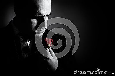 Black and white portrait of man, godfather-like character. Stock Photo