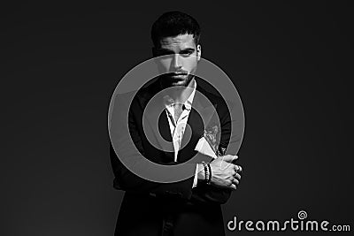 Black and white portrait of a sexy man in tuxedo Stock Photo