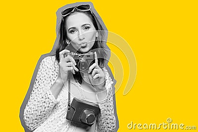 Black white portrait of a traveler girl shoots to the camera with a yellow stroke Stock Photo