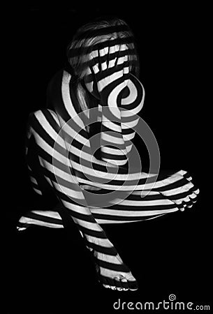 Black and white projection on a female naked body. Stock Photo