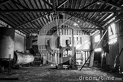 Black and White Rustic Industrial Interior of Abandoned Cannery Warehouse Stock Photo