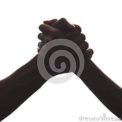 Black and white silhouette of hands on white background, handshake, friendship Stock Photo