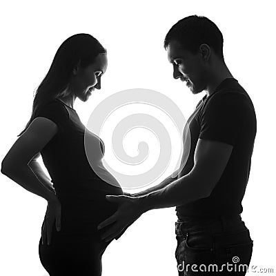 Black and white silhouette portrait pregnant woman and man, long-awaited happy pregnancy, family, silhouette couple, ivf pregnancy Stock Photo