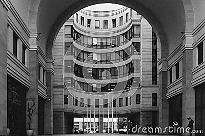 Black and white view from arch to monumental house, Yerevan, Armenia Stock Photo