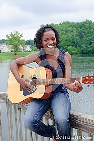 Black Woman with Guitar Stock Photo