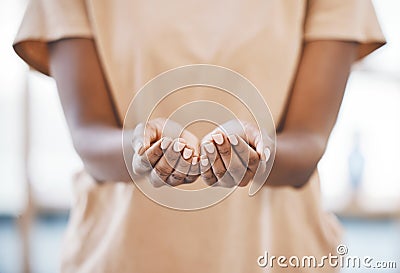 Black woman with hands out for charity, donation or help with kindness or respect. Palms open to ask, give or receive Stock Photo