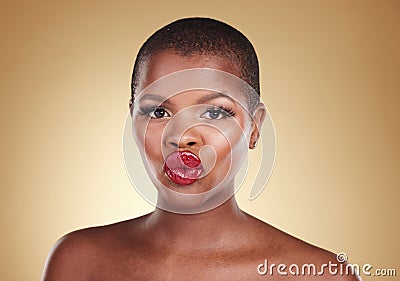 Black woman, lips and kiss, red lipstick and beauty with makeup and portrait isolated on studio background. Pout Stock Photo