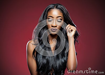 Black woman with long luxurious shiny hair Stock Photo