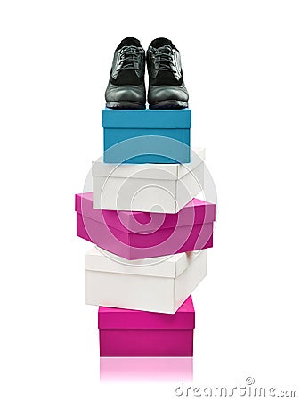 Black Woman Shoes on top of stacked boxes isolated Stock Photo