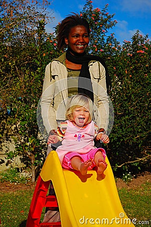 Black woman, white baby Stock Photo