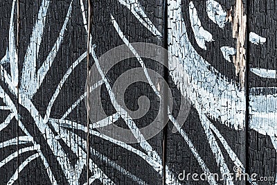 Black wood texture with abstract drawing Stock Photo