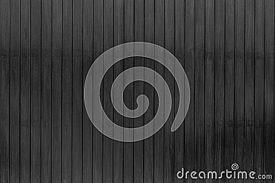 Black wood texture background. Dark wood plank abstract background. Empty black wooden wall. Wooden board. Black hardwood timber. Stock Photo