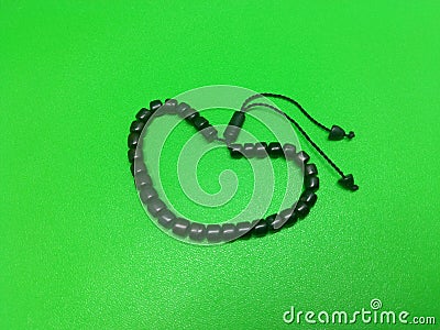 Black wooden tasbih bracelet Stock Photo