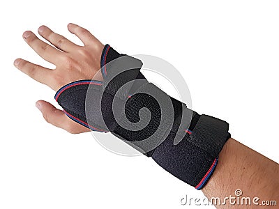 Black wrist splint for right hand male model. Stock Photo