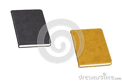 Black and yellow coloured pocket leather daily planners. Stock Photo