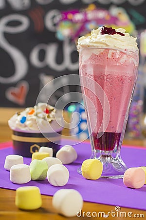 Blackberry milkshake decorated with marshmello Stock Photo