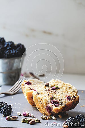 Blackberry, pistachio and chocolate chips mini cakes Stock Photo