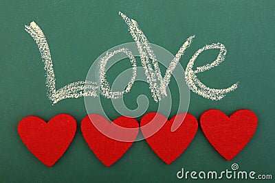 Blackboard love with four hearts Stock Photo