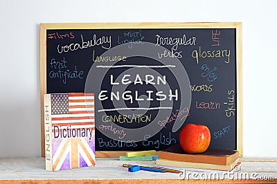 Blackboard and school material in an English class Stock Photo