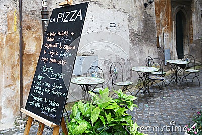 Blackboard & tables of a pizzeria in Rome Stock Photo