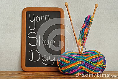A blackboard with he words Yarn Shop Day Stock Photo