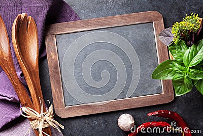 Blackboard for your text and garden herbs Stock Photo