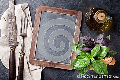 Blackboard for your text and garden herbs Stock Photo