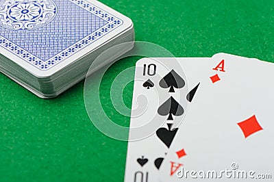 Blackjack.Playing cards on a green background Stock Photo