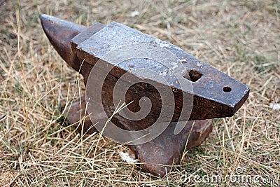 Blacksmith anvil standing on the ground Stock Photo